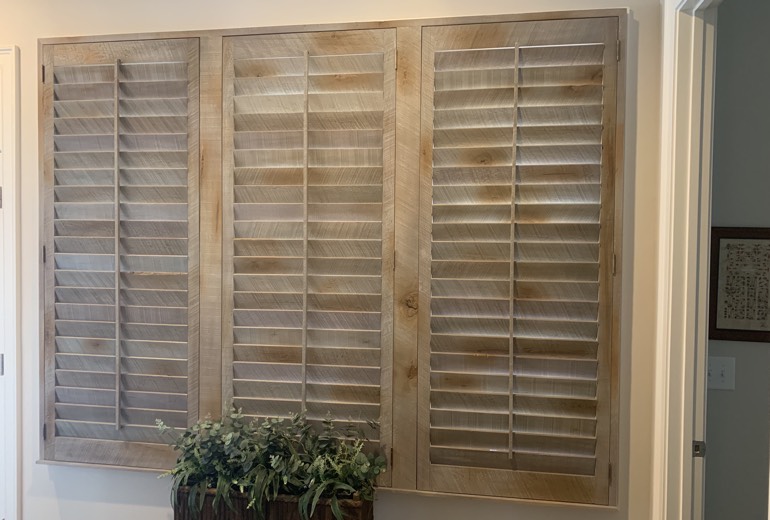 Closed reclaimed wood shutters in Southern California